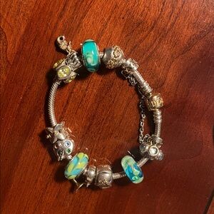 Gold and Silver Pandora Charm Bracelet